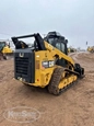 Used Skid Steer in yard